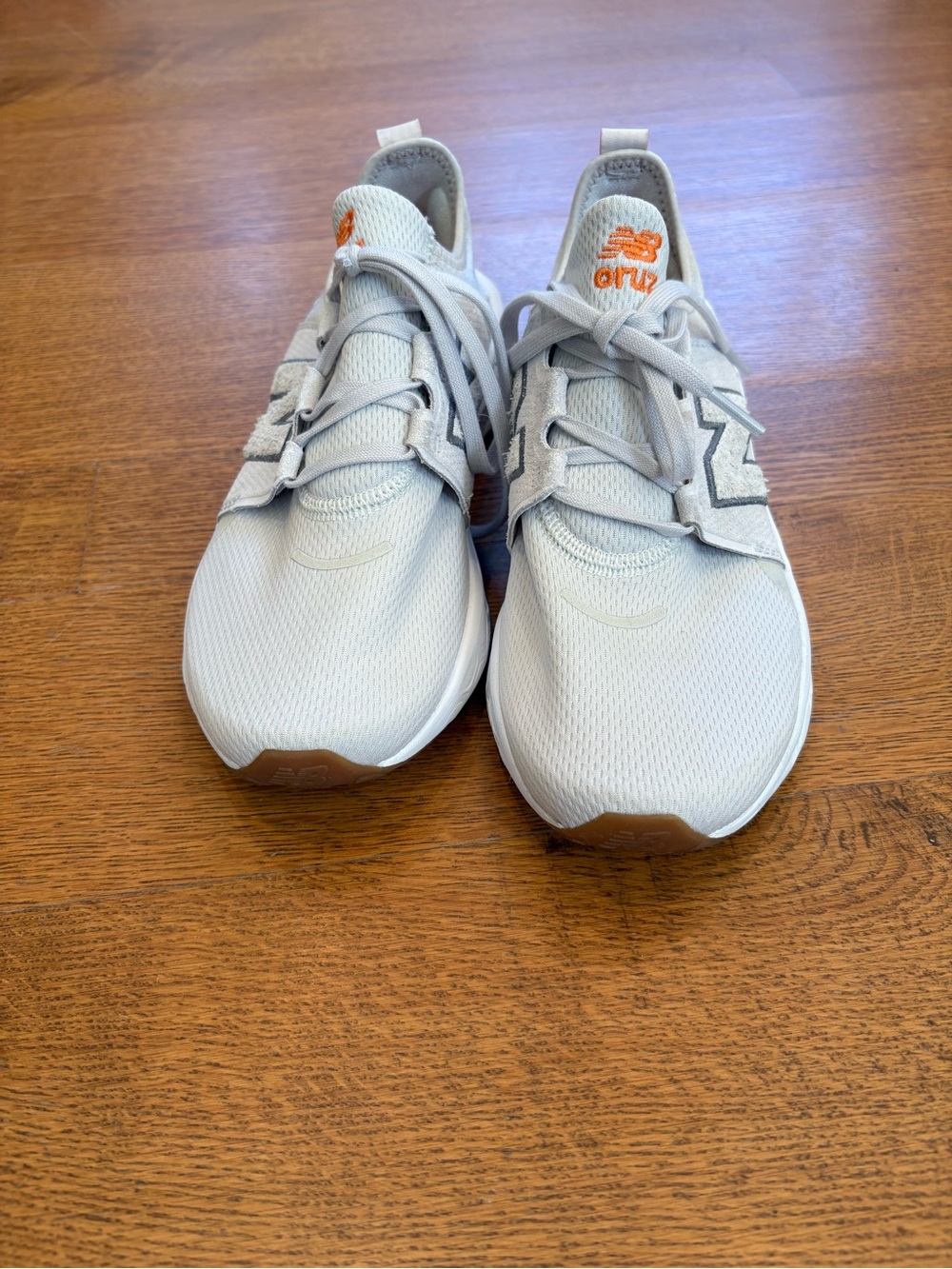 New Balance Kids Mesh Sneakers in Light Gray with Orange Logo